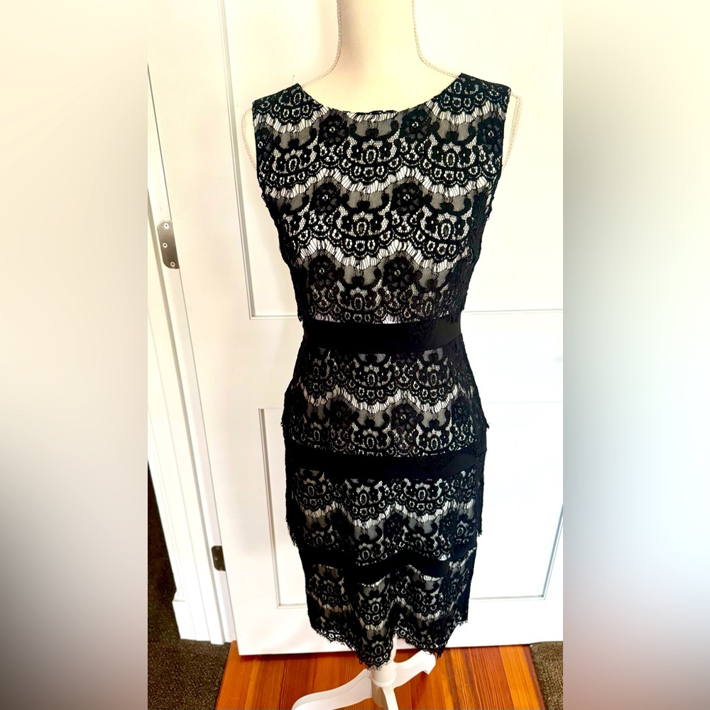 Cocktail dress by Cache. Lovely white with black lace overlay dress. NWT!